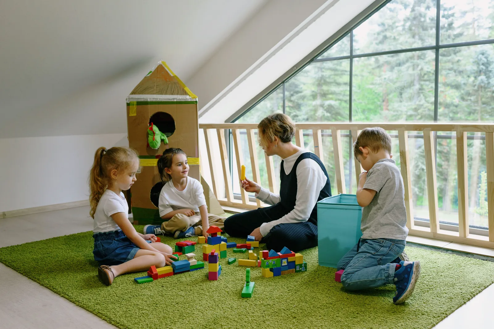 Children taking part in guided play with an adult