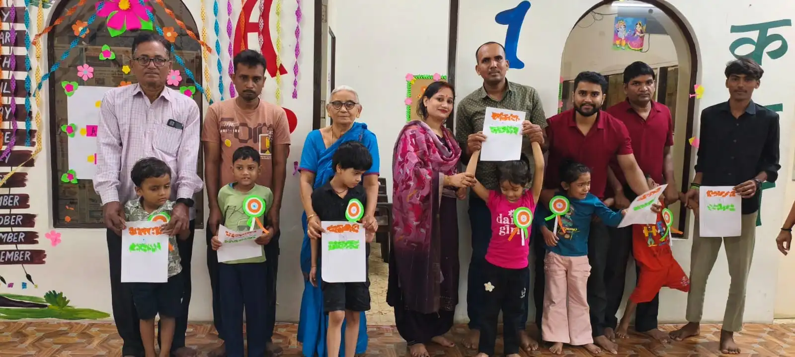 Group photograph of children, parents and staff at Integrated Institute for Child Therapy Centre