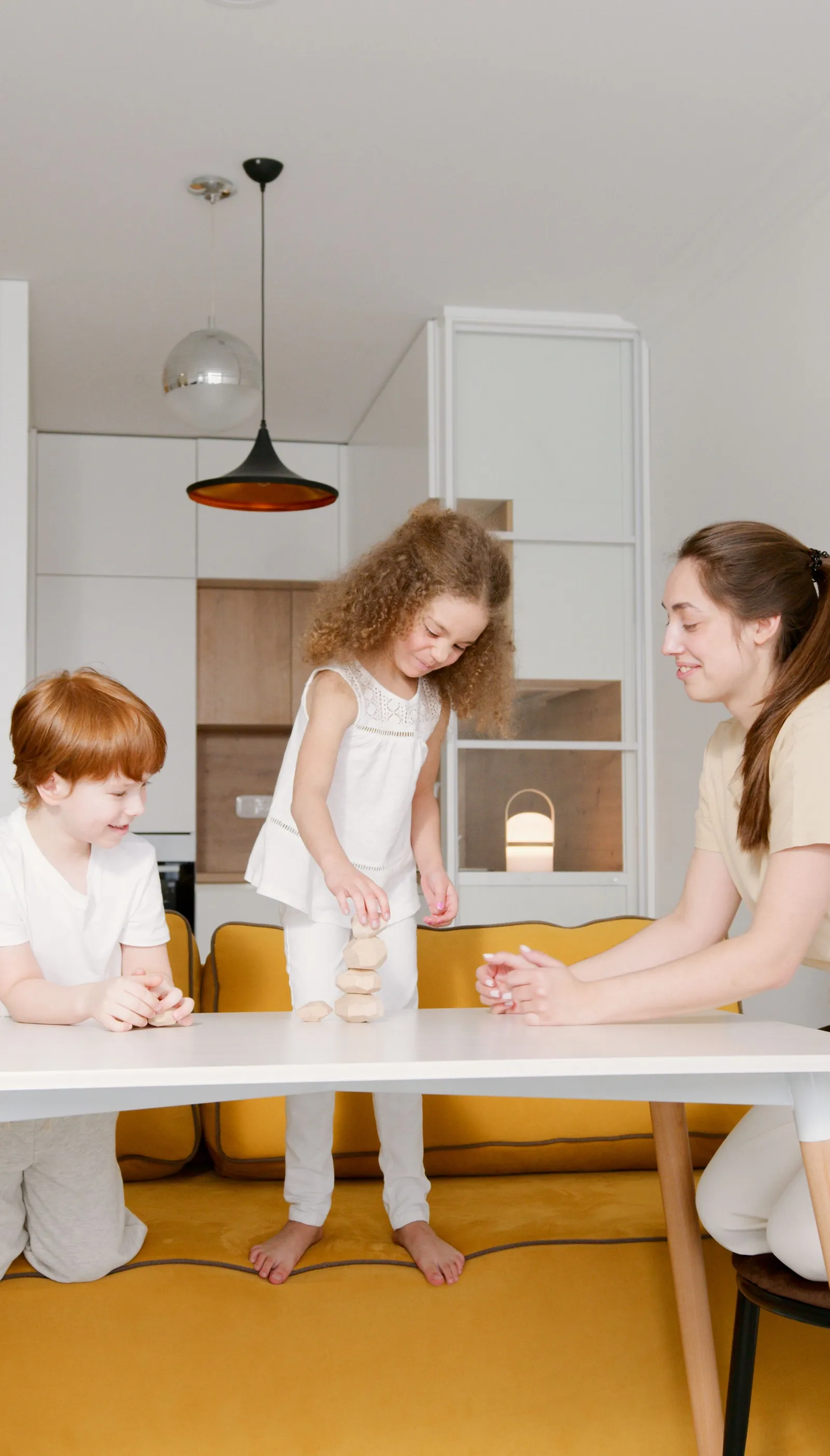 Parent and children taking part in a guided learning activity
